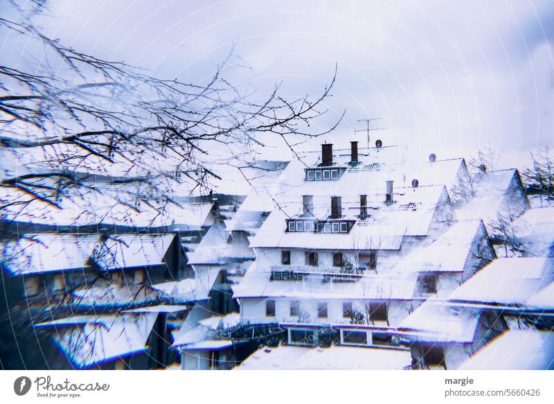Chimneys on snow-covered roofs Snow houses rooftop landscape chimneys Window Winter Abstract Cold Building Exterior shot Town Architecture blurred Experimental