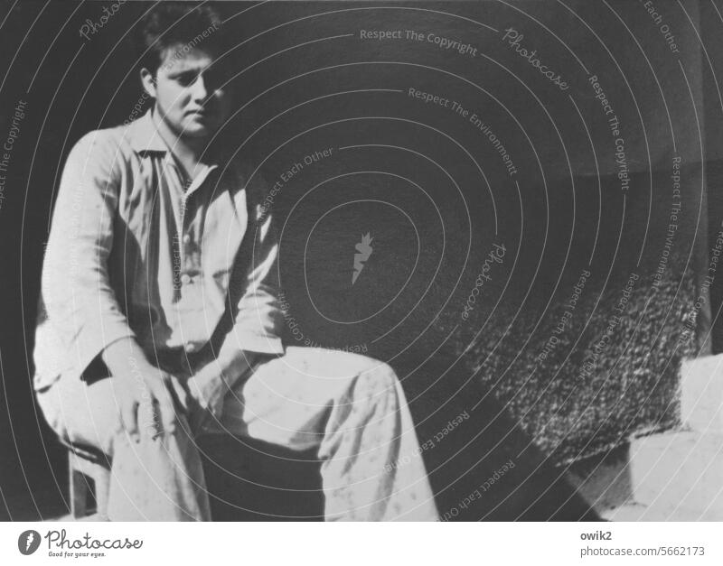 PAUL Young man sedentary exhausted depressed dejected sad rest Past old photo Memory Former Black & white photo Portrait photo contemporary document