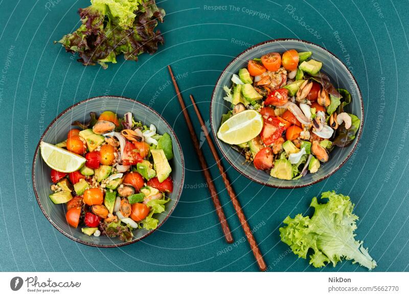 Vegetable salad with seafood. crab dieting squid lettuce lobster healthy eating prawn delicatessen tomato thai shellfish chopstick top view ketogenic mixed bowl