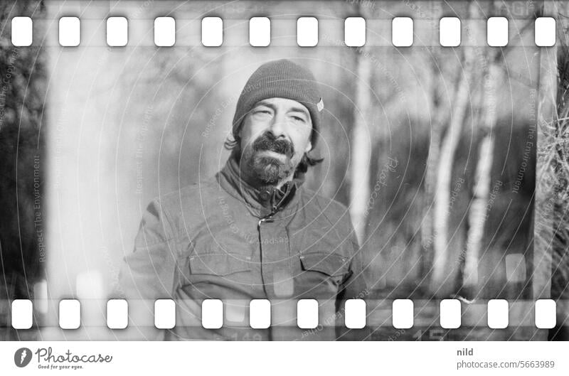 On the old Rhine in Vorarlberg portrait Man masculine Facial hair bearded Looking into the camera Winter Black & white photo Shallow depth of field Face Adults
