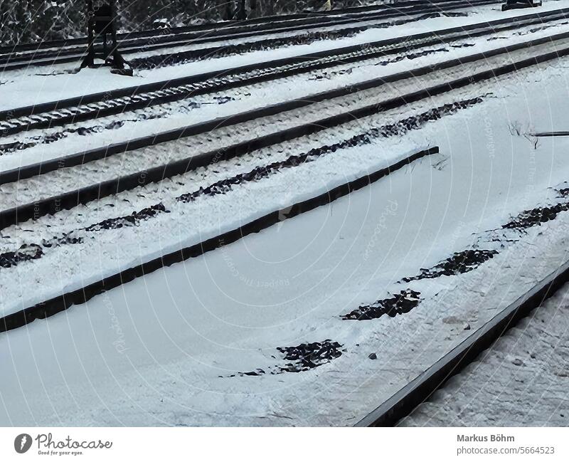 Rails covered in snow. Photo was taken in Porz station on 19.01.2024. Looks different, rails in the snow. Snow Track db German Railway Snow time Cologne