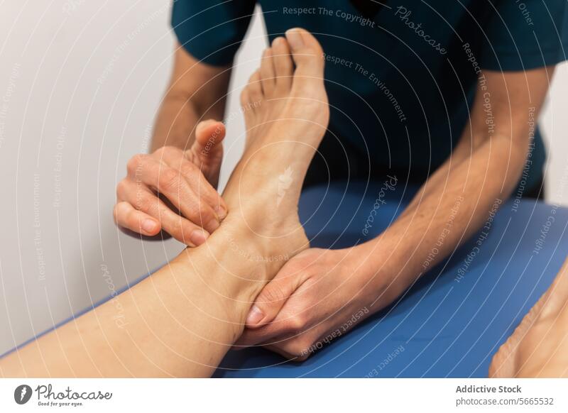 Physical therapist examining a patient's foot physical therapy foot examination palpation clinical table medical practitioner treatment assessment diagnostic