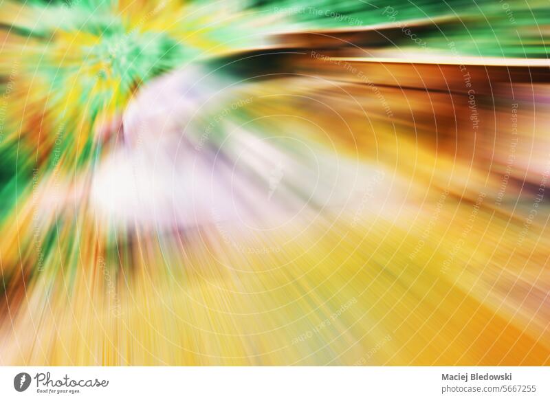 Motioned blurred abstract colorful background or wallpaper. motion bright hippie psychedelic design light futuristic shape gradient defocused effect glow photo