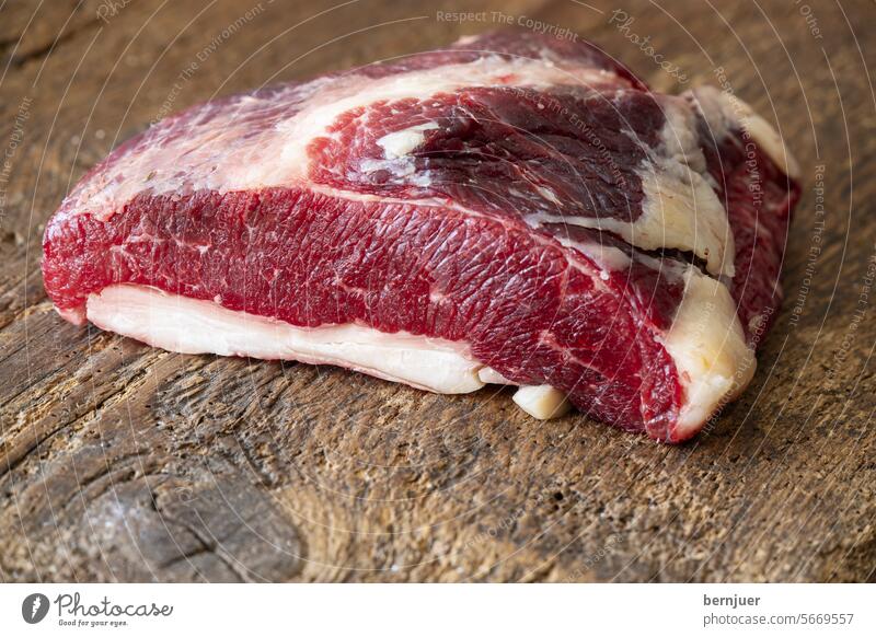Raw meat on dark wood soup meat Fat sirloin Meat Eating uncooked Beef Pepper plan albumen Slice Cut Fresh Wood background Rosemary angus ingredient Table boil