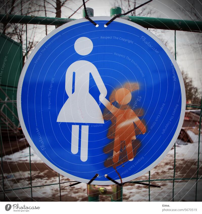 typically German | hostile to children sign Woman Child Adults traffic information Hoarding graffiti crossed out painted over corrupted Smeared