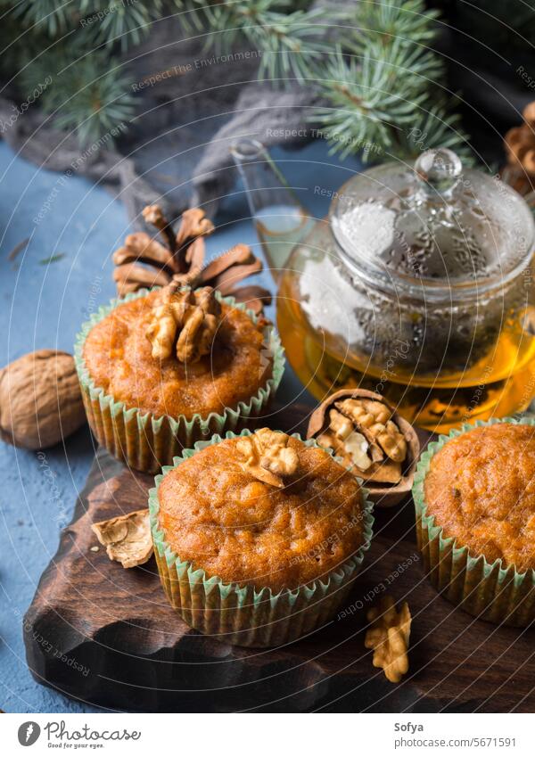 Winter Carrot spiced muffins with walnuts carrot christmas new year winter sweet food cake vegetable bake home holiday festive branch tree green fir pine cone