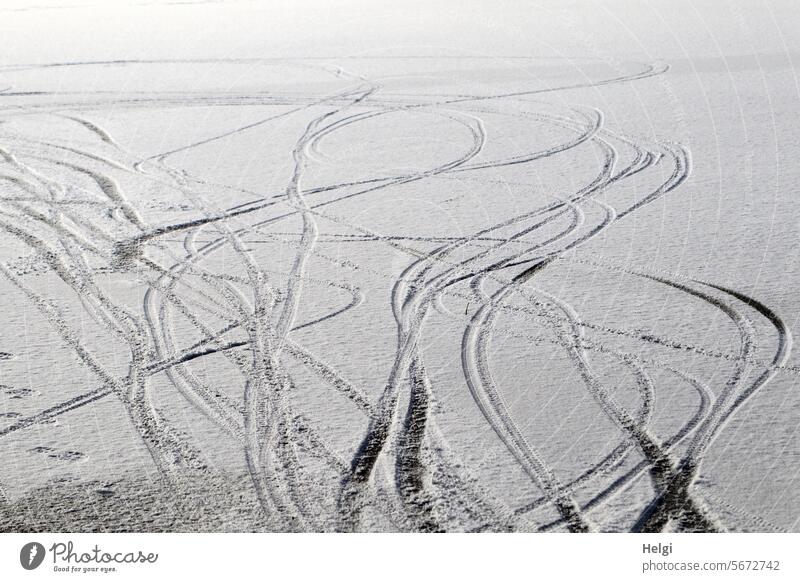 R for ... | Tire tracks in the snow on the frozen lake Tracks Skid marks Snow Ice Lake chill Frost Winter Freeze Cold Frozen Nature Winter mood White