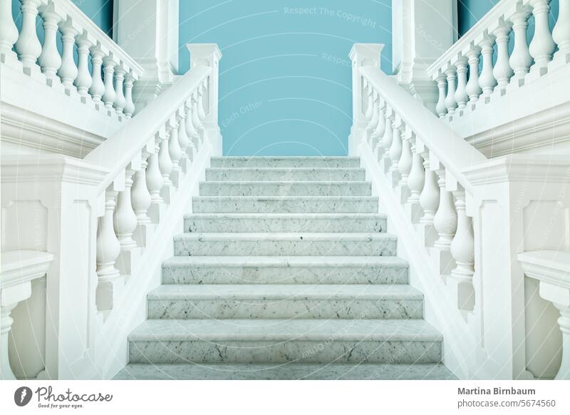 Elegant symmetric white staircase with a blue wall behind railings stairwell architecture perspective construction symmetry structure background building stairs