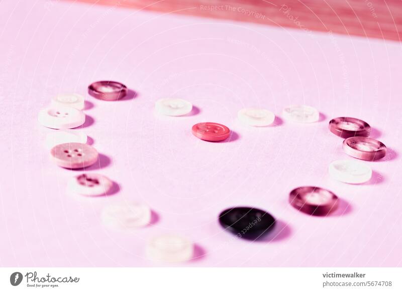 Heart shape with colored buttons heart shape love background pink color symbol valentine card romantic studio shot romance honeymoon falling in love wedding