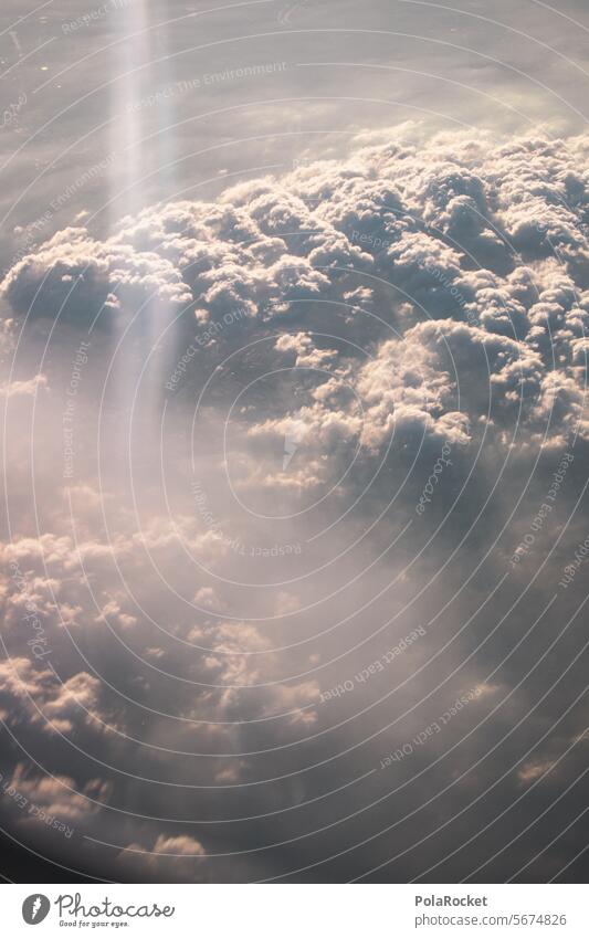 #A0# sky Sky Heaven Canopy (sky) Clouds Skyward Airplane window Colour photo Compass point Exterior shot Sky blue Himmelsstürmer Sunlight Light