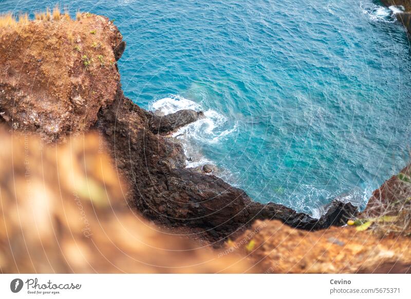 Madeira coast Portugal Water Rock Ocean Cliff break-off edge depth blue water vacation Vacation mood Relaxation rock ocean North Atlantic Hiking Nature Stone