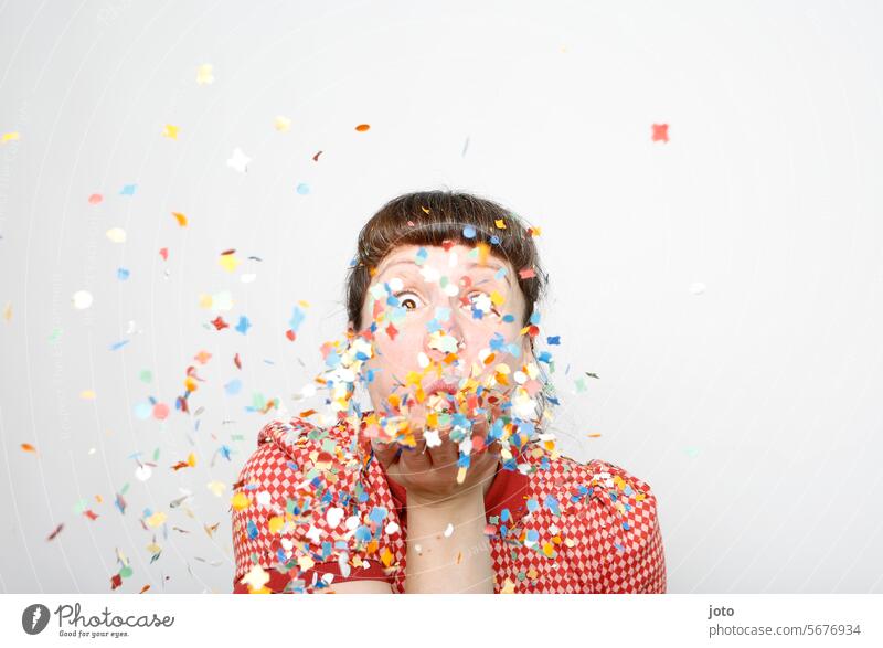 Woman blows colorful confetti into the air Confetti showery with confetti variegated Party Party mood Party goer Feasts & Celebrations Birthday fortunate