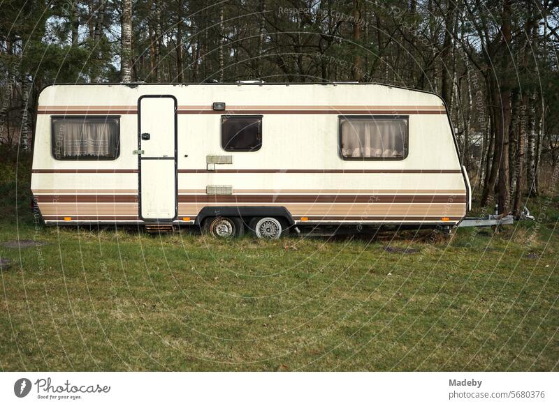 Caravans in beige and natural colors for camping and vanlife on the campsite at the glider airfield in Oerlinghausen near Bielefeld on the Hermannsweg in the Teutoburg Forest in East Westphalia-Lippe
