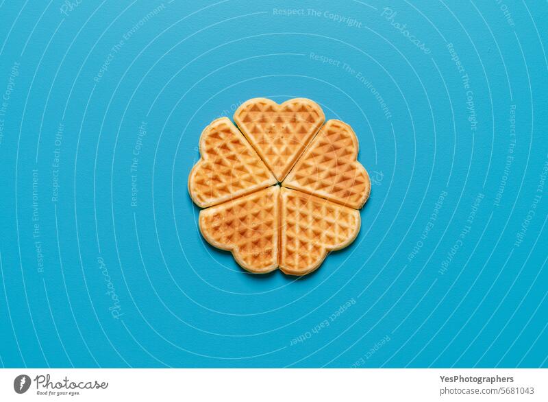 Homemade waffles top view, isolated on a blue background above baked baking belgian biscuit breakfast bright cake calories color colorful cuisine delicious