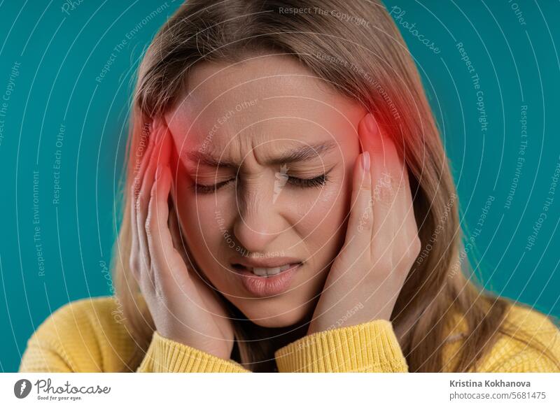 Portrait of beautiful suffering woman having headache, studio portrait. Migraine adult attack attractive cluster headaches crisis depression distressed