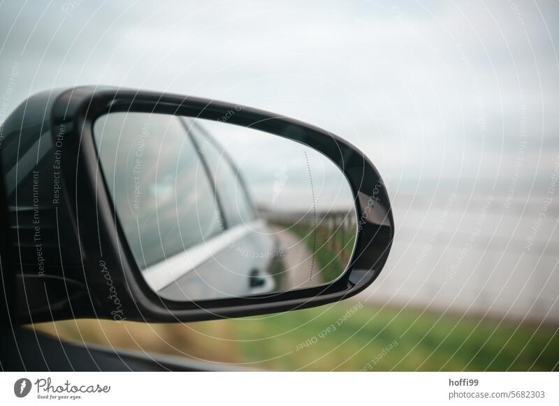 the view back into the void through the wing mirror when driving slowly in the car Looking look back exterior mirrors Review innovation Mirror Reflection Car
