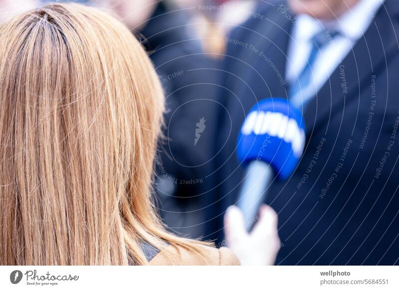 Journalist holding microphone making media interview news journalist journalism public relations pr publicity event reporter press news conference broadcasting