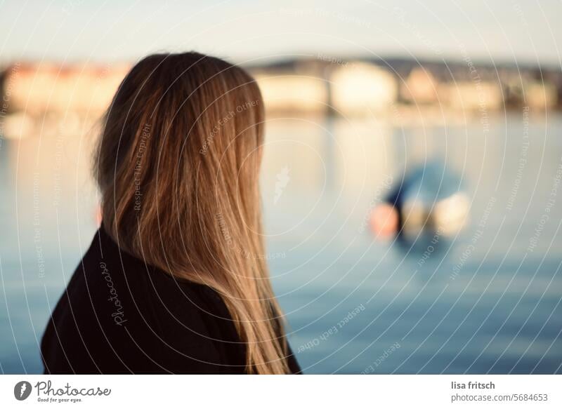 WATCHING - LAKE ZURICH - PEACE AND QUIET Woman rear view hair Water Lake zurich Observe Calm silent tranquillity Exterior shot Colour photo Tourism