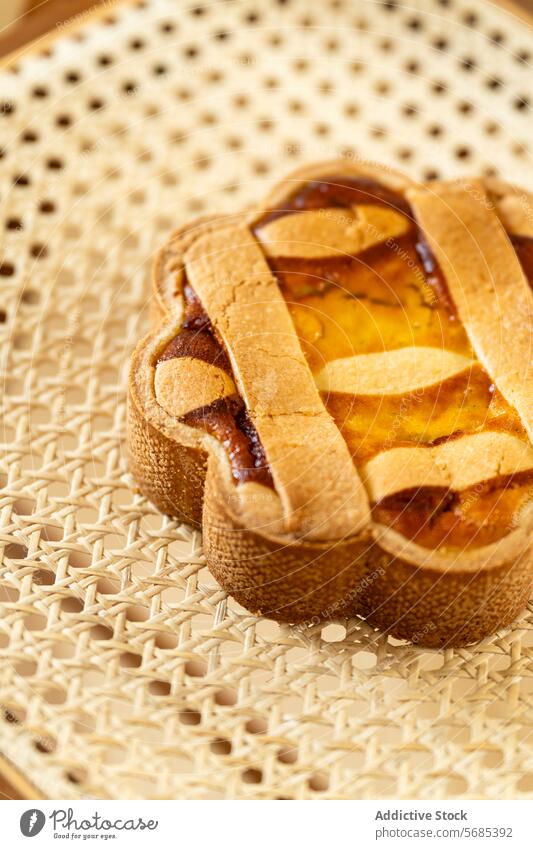 Traditional Italian Easter Pastiera on rattan chair italian easter pastiera napoletana pie sweet dessert traditional citrus flavor baked pastry ricotta filling
