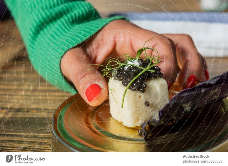 Exquisite fusion cuisine at Michelin-starred Zermatt restaurant hand gourmet michelin zermatt switzerland local seasonal ingredient caviar dish presentation