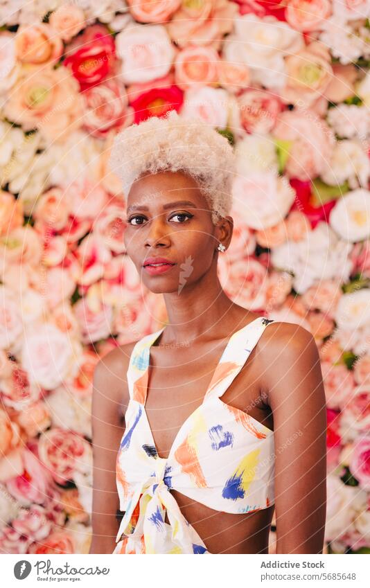 Stylish black woman with makeup flower appearance short hair style portrait elegant feminine queer hairstyle young charming fashion confident floral trendy
