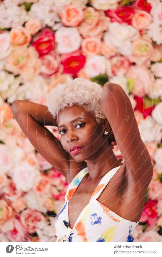 Stylish black woman with makeup flower appearance short hair style portrait elegant feminine queer hairstyle young charming fashion confident floral trendy