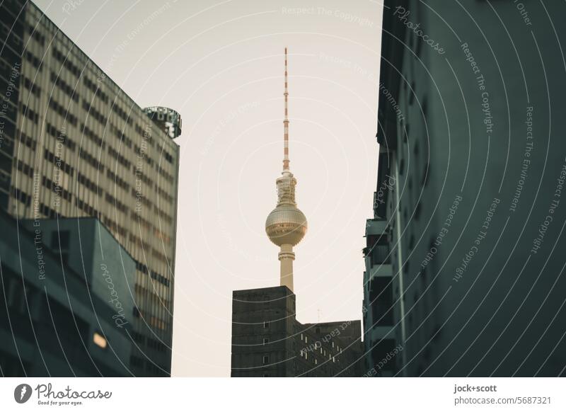 Television tower between facades Berlin TV Tower Facade Berlin Courier Capital city Downtown Berlin between them Landmark Sky High-rise Gloomy Authentic City
