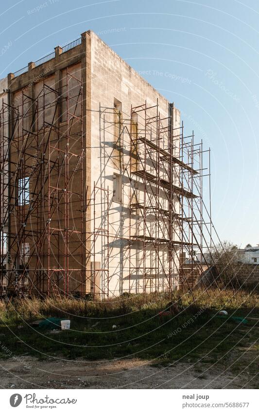 Old building surrounded by scaffolding; walls up! Architecture Race renovation core renovation Facade Scaffold shabby Building Redevelop Change Scaffolding