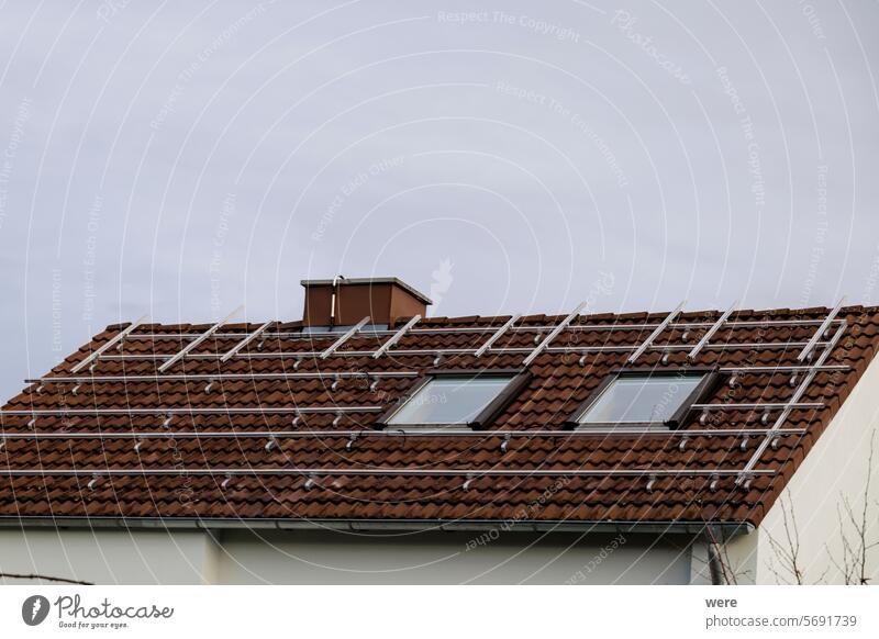 Roof of a residential building with prepared substructure for a photovoltaic system energy policy Building Climate change Copy Space Decarbonization Electricity