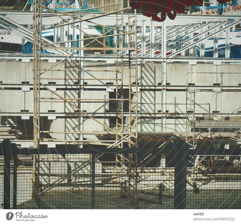 Everything under control dockyard factory premises Manmade structures Facade unfinished Scaffold Construction site Scaffolding linkage Build Building