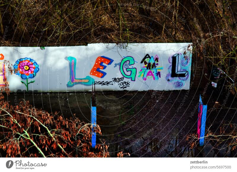 LEGAL mural Wall (building) urban typography Text Tagging (graffiti) tagg Scene Town sprayer Damage to property policy message Message Wall (barrier) Art