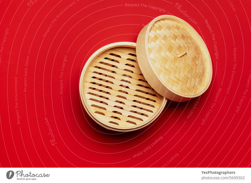 Bamboo steamer above view, isolated on a red background asian bamboo basket blank bright chinese color cooking copy space cuisine cut out diet dim empty