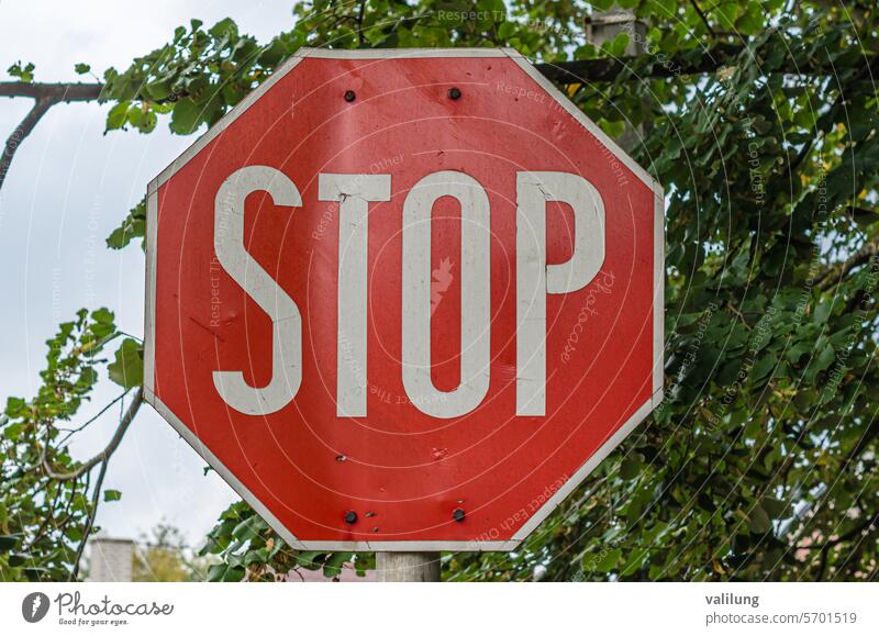 Stop traffic sign attention background control danger forbidden outdoors post red road roadside safety signage signal single stop street symbol transport