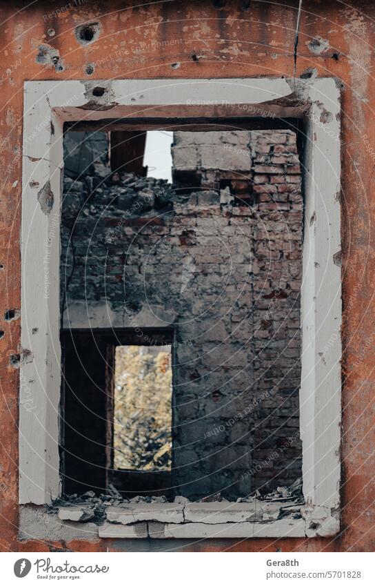empty window of a destroyed house in Ukraine Donetsk Kherson Kyiv Lugansk Mariupol Russia Zaporozhye abandon abandoned attack bakhmut blown up bombardment