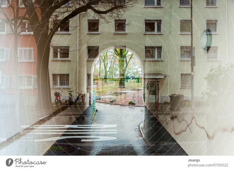 passage Apartment house Facade Window Irritation Passage Double exposure Abstract Tree Lanes & trails Portal Backyard Town House (Residential Structure)