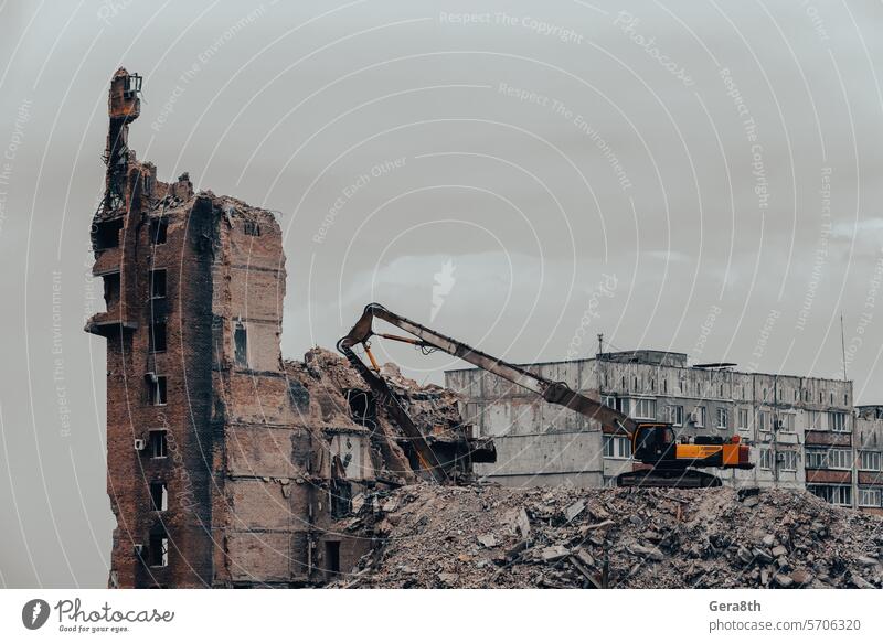 construction equipment destroys affected houses war in Ukraine Donetsk Kherson Kyiv Lugansk Mariupol Russia Zaporozhye abandon abandoned attack blown up