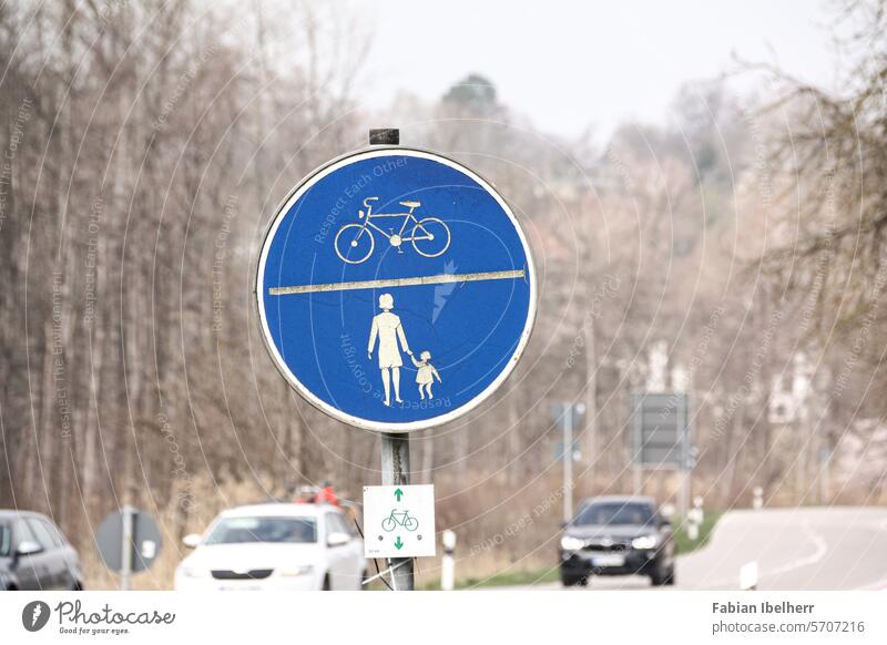 Traffic sign indicates shared cycle path and footpath Footpath cyclists Pedestrian Road sign Germany
