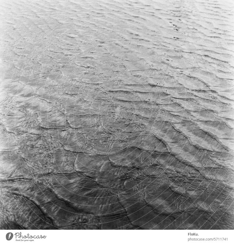 Water surface in analog black and white Surface of water Ocean North Sea North Sea coast Waves Wet Nature Vacation & Travel Beach Environment Elements
