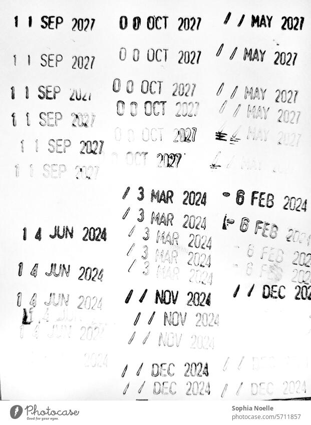 Dates stamped in ink on paper date book datebook Termine der Termin Calendar Paper Digits and numbers Time Year date digit Jahresdaten Text die Ziffer die Zahl