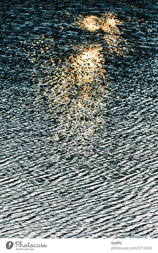 Sunlight reflection in the water Light reflection Water Undulating mirrored Water reflection Waves Surface of water Reflection Light and shadow