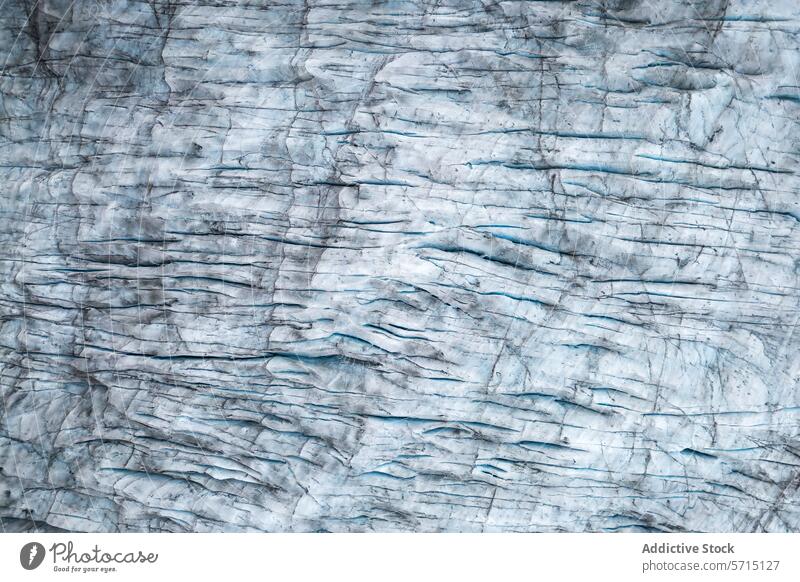 VatnajÃ¶kull glacier's mesmerizing texture and patterns aerial view vatnajÃ¶kull iceland nature artistry blue ridge crevasse abstract natural phenomenon frozen