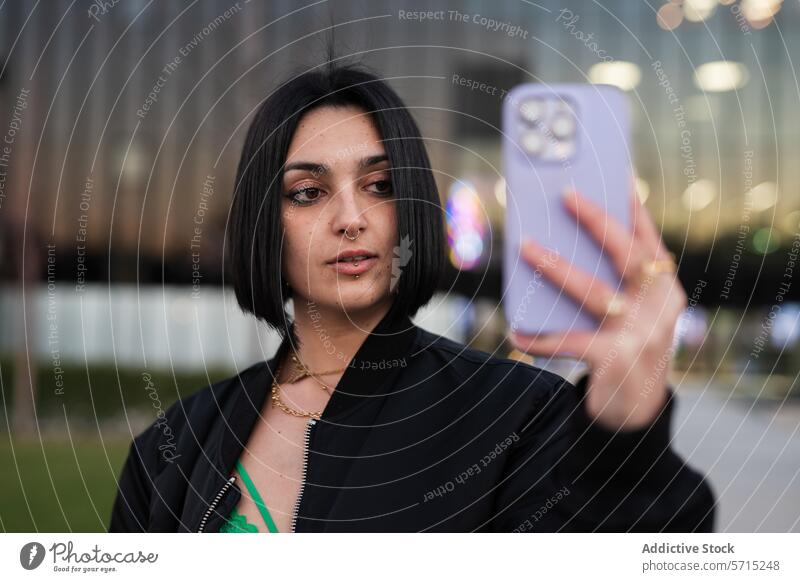 Urban style selfie with Four Towers in Madrid woman smartphone urban madrid four towers spain fashion young adult city technology mobile photography modern