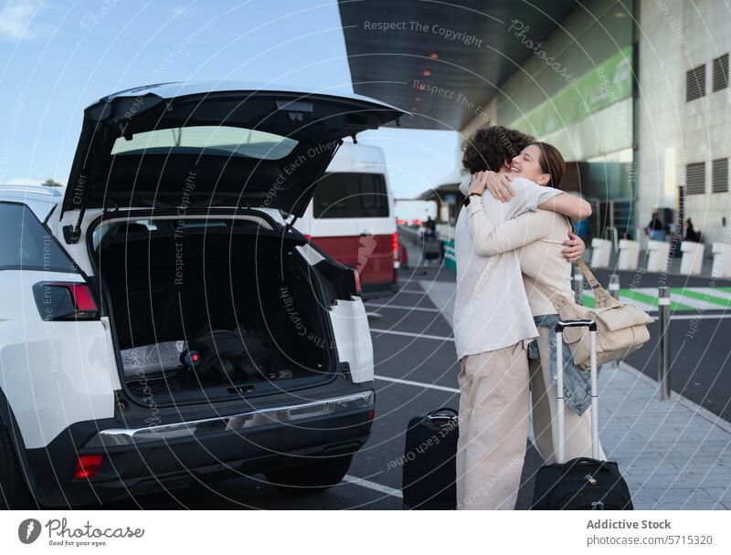 Tearful goodbyes at the airport departure drop-off embrace emotional journey luggage car travel man woman hug farewell tearful transport vehicle trunk baggage