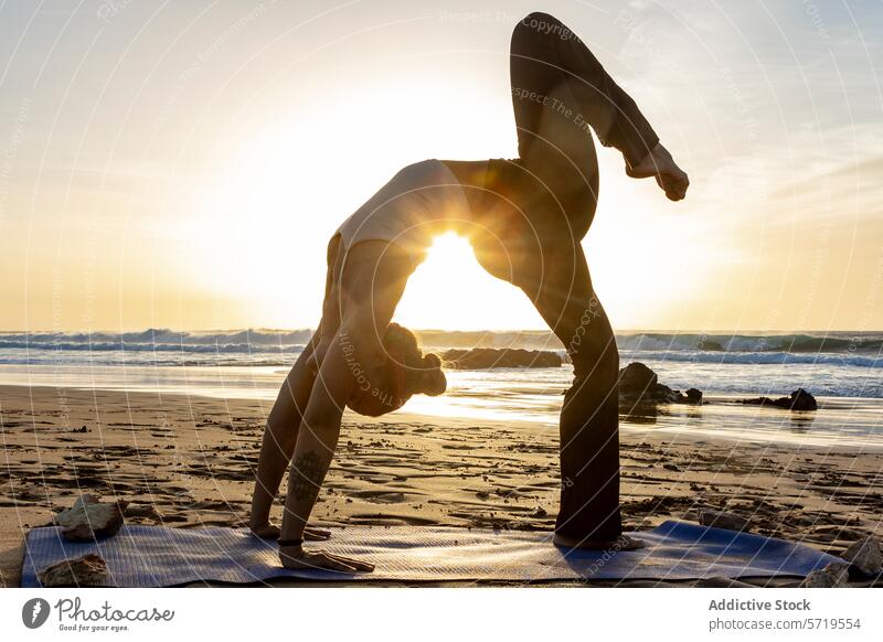 Yoga practice at sunset on the beach yoga pose tranquil sand woman inspiration water ocean waves silhouette meditation balance flexibility strength mindfulness