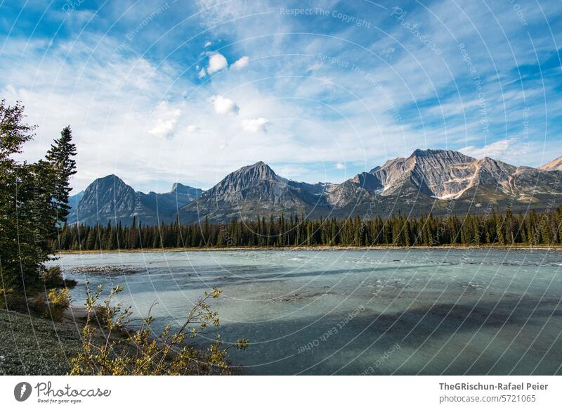 River with mountains in the background - Panorama Canada Mountain Clouds Water Icefield parkway Rocky Mountains Vacation & Travel Exterior shot Colour photo