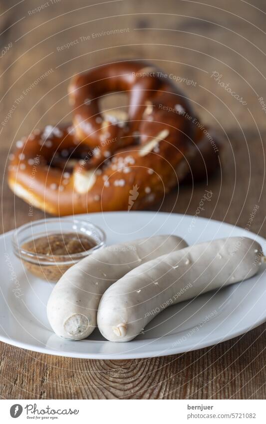Bavarian veal sausages on wood Veal sausage Meat Eating Munich Oktoberfest Firm Tradition Pretzel White Mustard Rustic Pork Germany Fresh Culture Blue biscuits