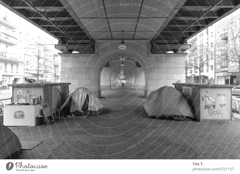 Homeless people's tents under the metro Berlin Prenzlauer Berg b/w 2024 viaduct Schönhauser Allee Tramp Poverty homeless Tent Town Winter Old town Downtown
