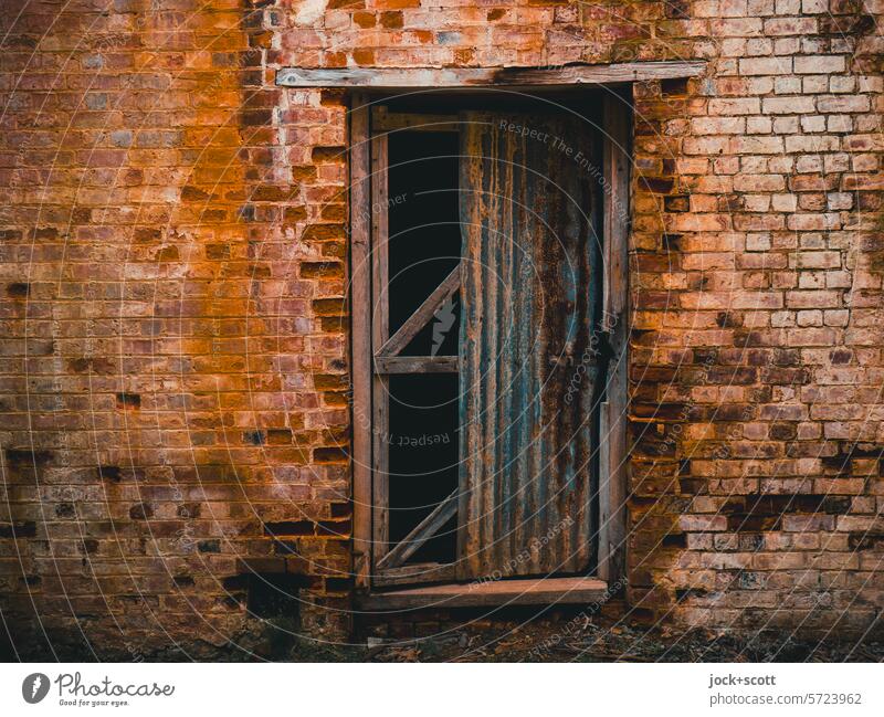 Old bricks tell their story Wall (building) door lost places Ravages of time Change Past Ruin Transience Derelict Weathered Apocalyptic sentiment