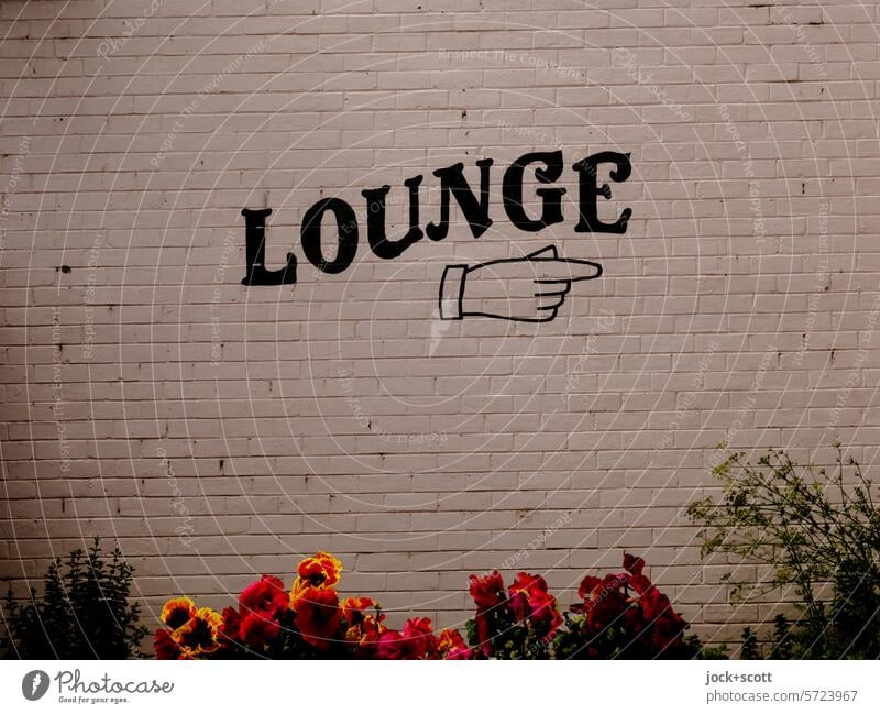 LOUNGE on the right-hand side Lounge Hand (symbol) Wall (barrier) Word Typography Symbols and metaphors Direction Pictogram Leisure and hobbies Orientation