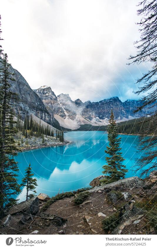 Moraine Lake in the morning with reflection Canada Mountain Clouds Water Icefield parkway Rocky Mountains Vacation & Travel Exterior shot Colour photo Tourism